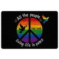 Rainbow LGBT doormat with peace symbol, colorful doves, black background, and inclusive entryway artwork