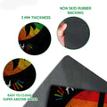 Close-up detail of the rainbow peace dove doormat showing the printed surface and rubber backing