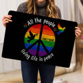 Rainbow LGBT peace dove doormat held upright to display its colorful inclusive artwork
