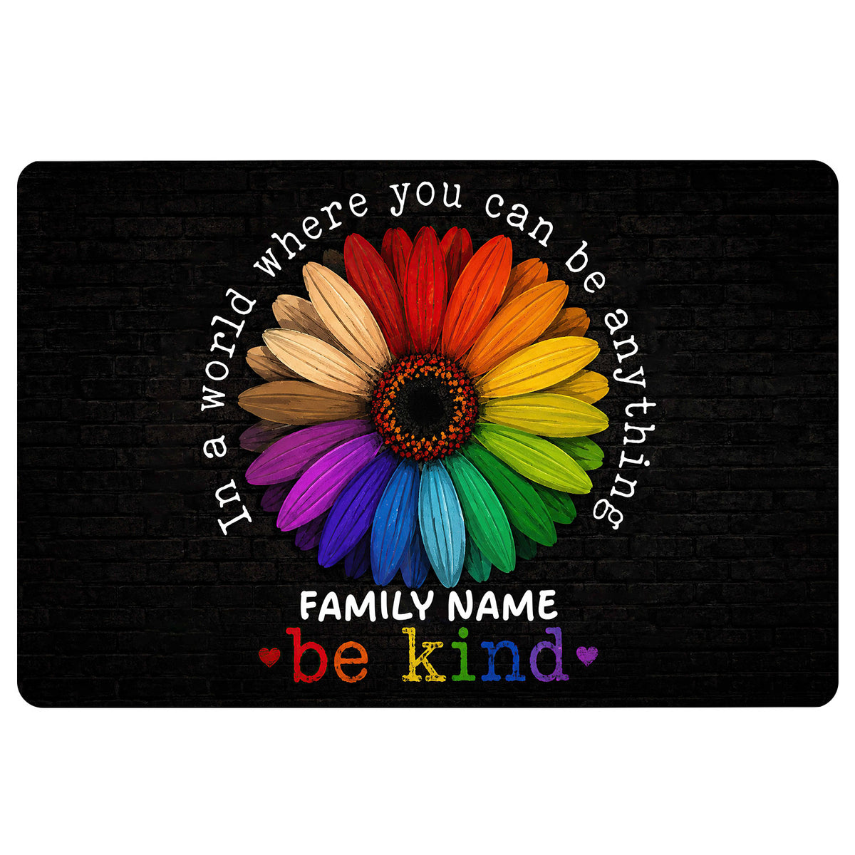 Black LGBT doormat with a colorful rainbow flower and inclusive kindness message