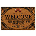 Wine-themed doormat with red wine glasses, ornate black scrollwork, and a welcoming entryway message