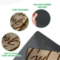 Close-up feature view of Christian doormat artwork with rubber backing and textured surface