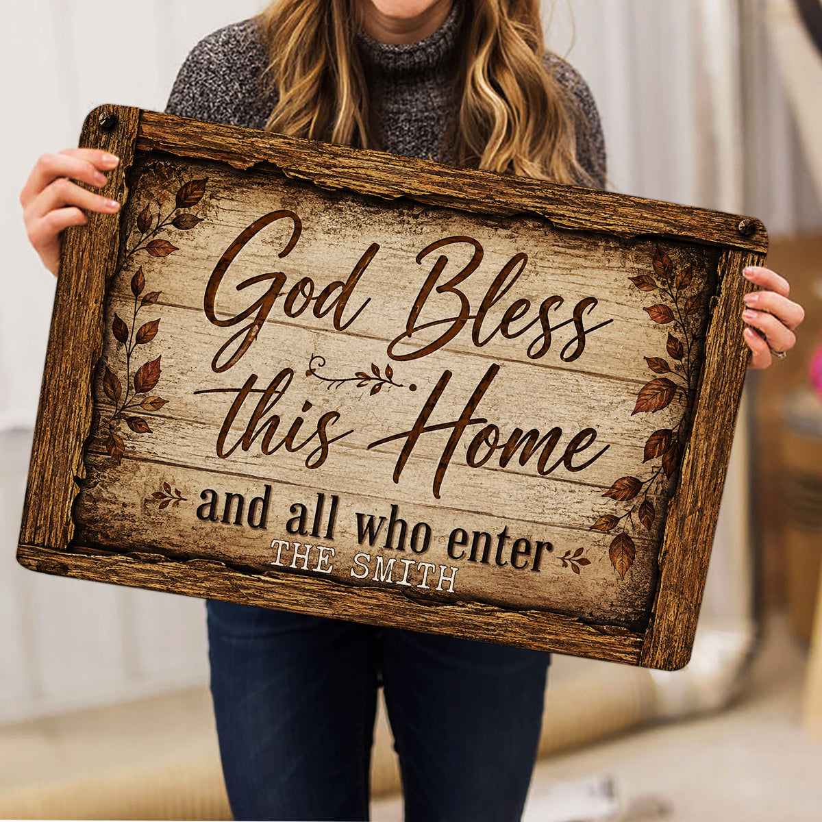 Person holding a rustic Christian God Bless This Home doormat in a home interior