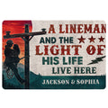 Lineman doormat featuring a utility worker, power pole, stars, lightning bolts, and rustic red and teal artwork