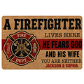 Firefighter doormat with a red and black fire department emblem and bold entryway artwork