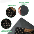 Close-up view of the veteran doormat surface and dark rubber backing with patriotic flag artwork