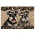 Miniature Schnauzer doormat with two detailed dog portraits, welcome lettering, and an ornate decorative border