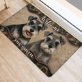 Miniature Schnauzer entryway rug featuring two dogs, welcome lettering, and a richly patterned border