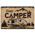 Camping doormat featuring a travel trailer, mountain landscape, evergreen trees, and rustic sepia artwork