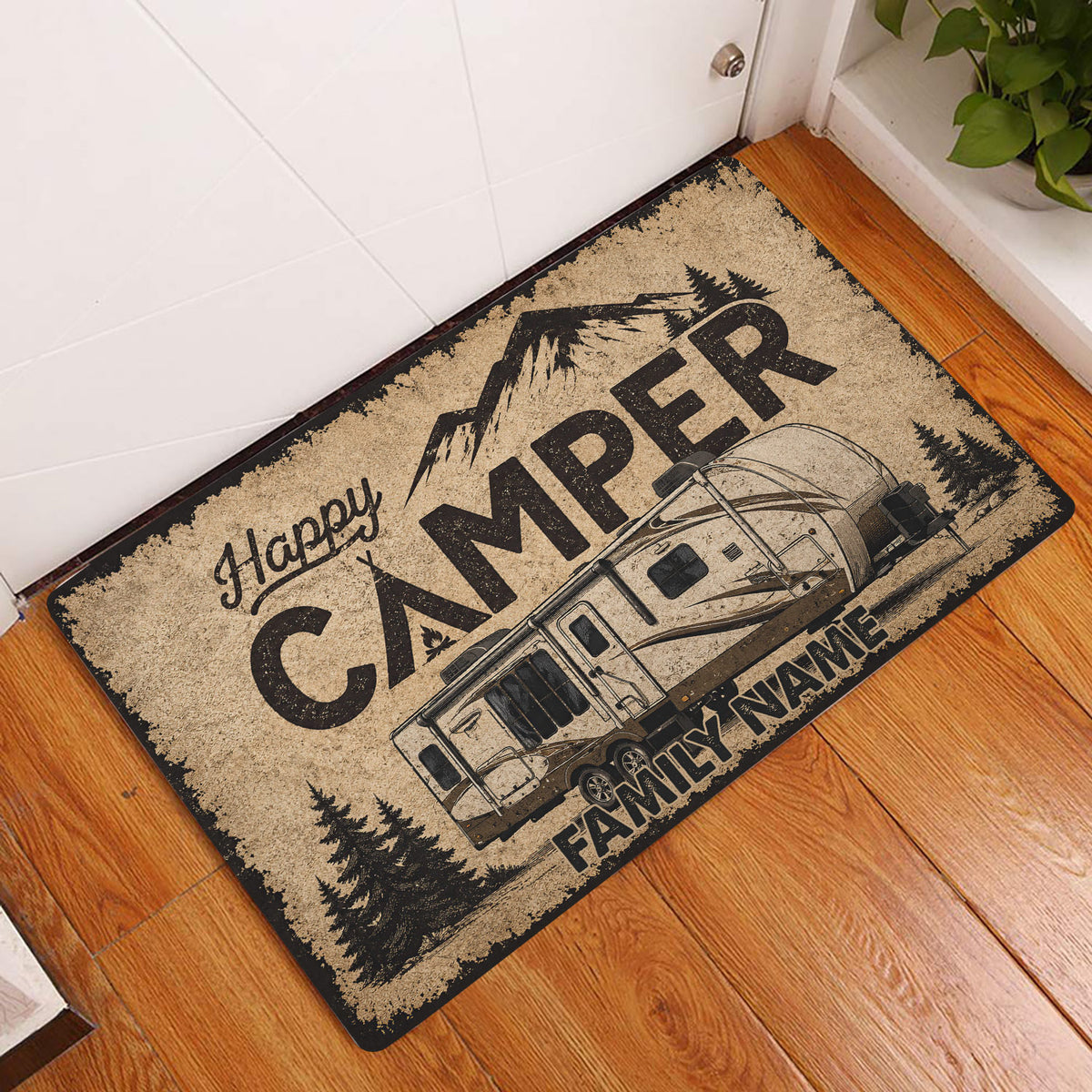 Camping entryway rug displayed beside a white door on a warm wood floor with trailer artwork