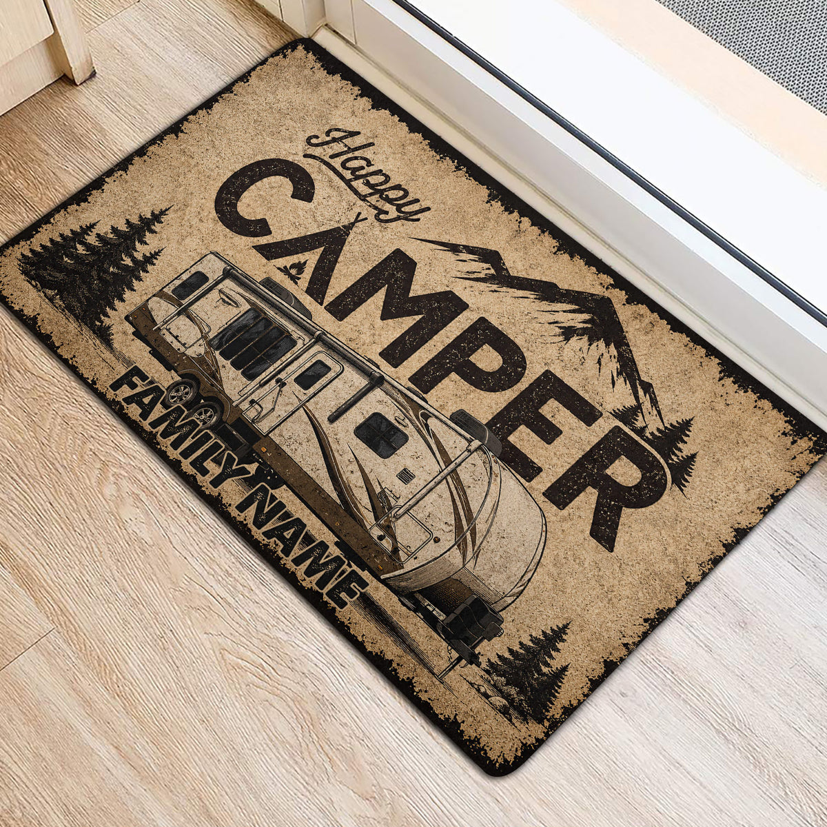 Rustic camping door mat placed at an entrance, showing a travel trailer, mountains, and pine trees