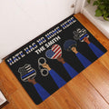 Police-themed doormat displayed at an indoor entryway with badge, handcuffs, hat, paw, and patriotic artwork