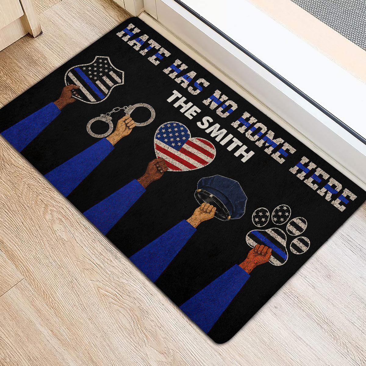 Law enforcement entryway mat shown beside a doorway with blue-line graphics, handcuffs, badge, and police hat
