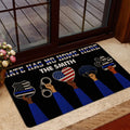 Police doormat styled at a home entrance with patriotic law enforcement artwork and bold black, blue, white, and red design