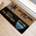 Police-themed welcome mat positioned near an entrance with badge and patrol vehicle artwork