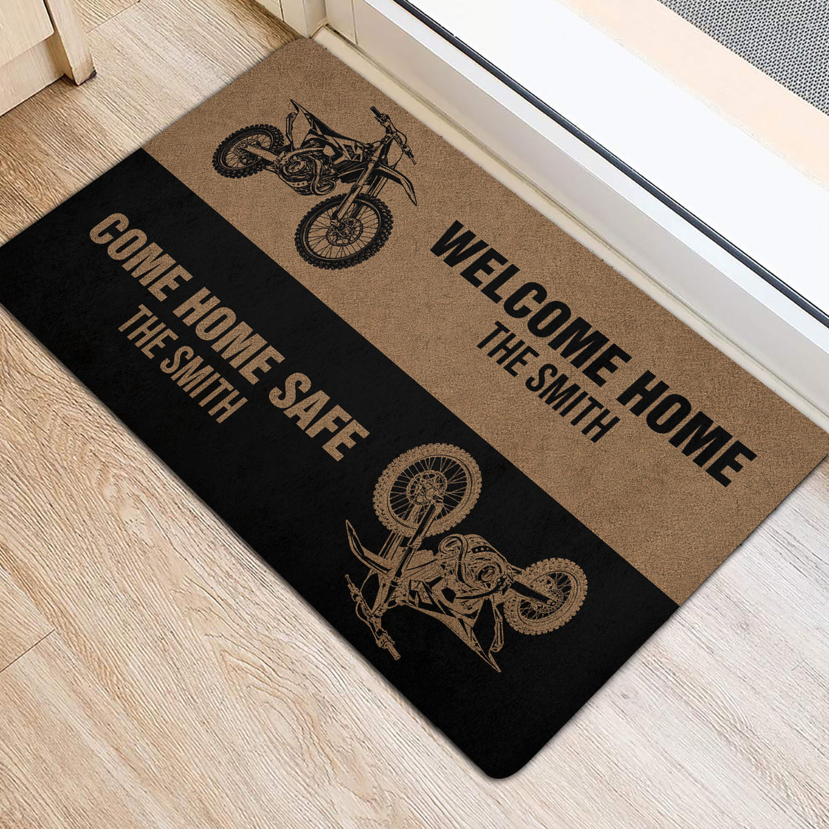 Motocross door mat positioned at an entryway, featuring dirt bikes and bold welcome home artwork