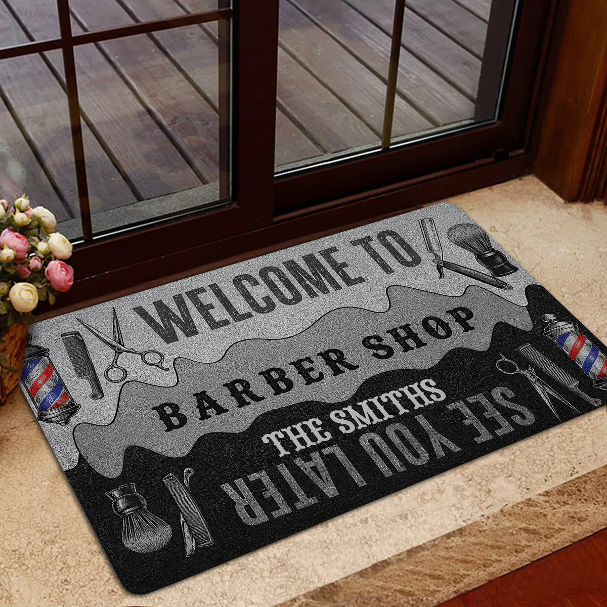 Barber shop doormat styled at a glass door with floral decor and an indoor entryway setting