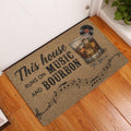Bourbon-themed doormat displayed at an indoor entryway on a warm wood floor