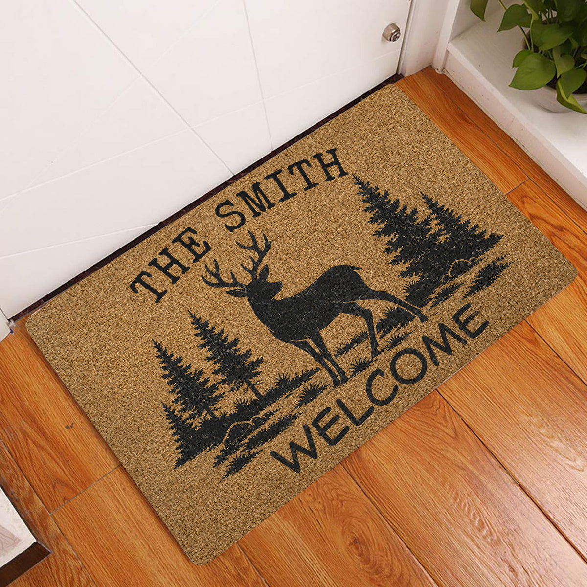 Deer hunting doormat displayed at a home entrance on warm wood flooring