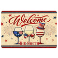 Wine-themed doormat with patriotic red, white and blue wine glasses, fireworks and a welcoming design