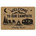 Camping doormat with mountains, pine trees, camp chairs, campfire, travel trailer, stars, and a crescent moon
