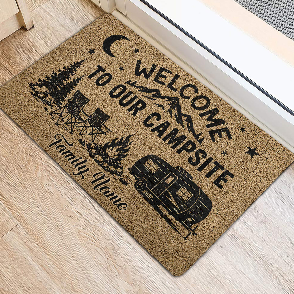 Camping door mat shown at an entrance with mountain scenery, pine trees, camp chairs, campfire, and travel trailer