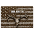 Rustic hunting doormat featuring a deer skull with antlers, distressed stripes, stars and a central family name area