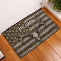 Hunting-themed doormat displayed in an entryway with a deer skull, antlers, distressed stripes and star details