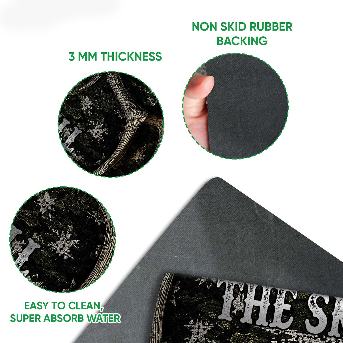 Close-up of hunting doormat artwork with a textured printed surface and dark rubber backing