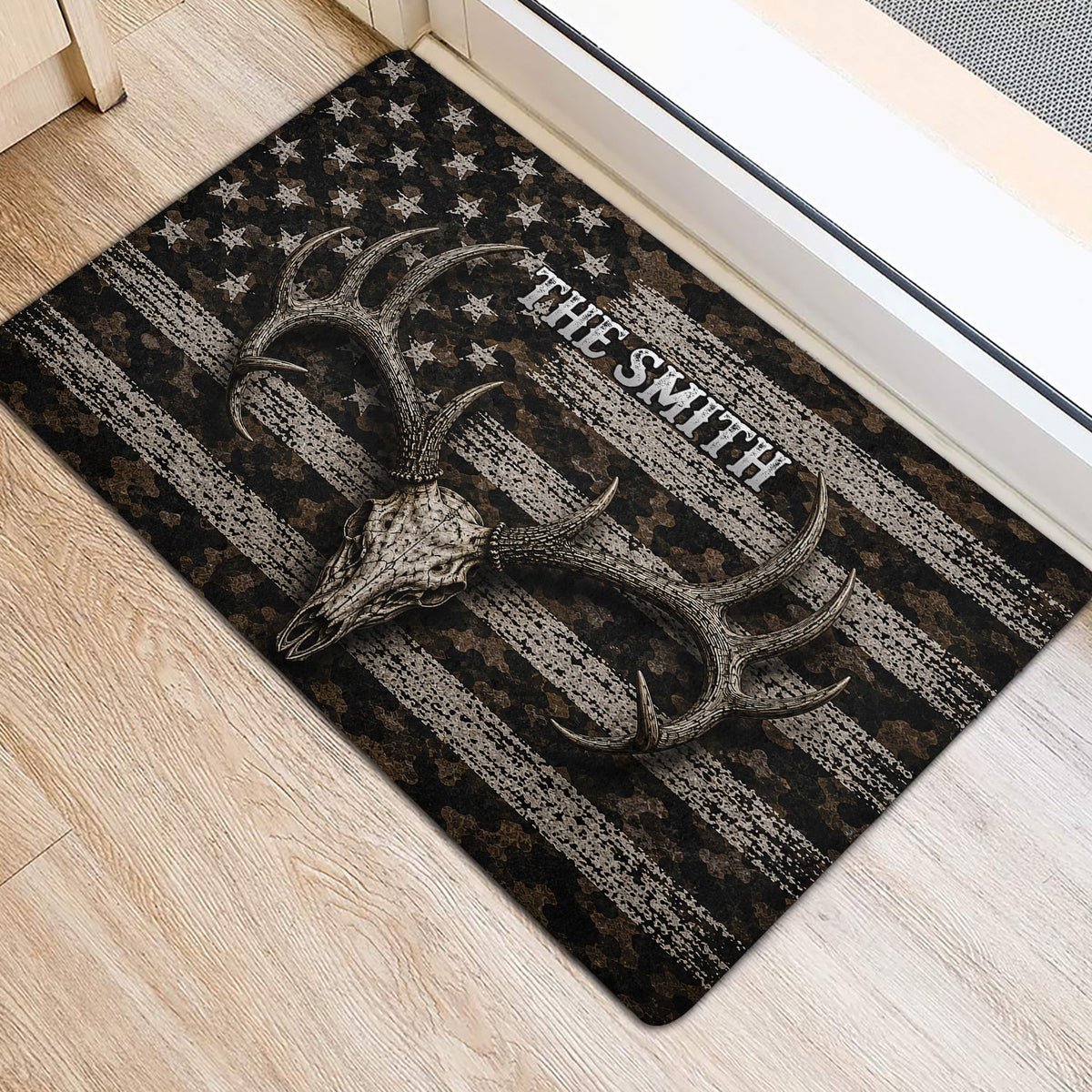 Hunting-themed door mat with skull and antlers shown beside an indoor doorway