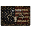 Hunting doormat with an antlered deer skull, rustic American flag design, stars, stripes and bold lettering