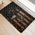 Rustic hunting doormat with deer skull, antlers and American flag artwork positioned at an entryway