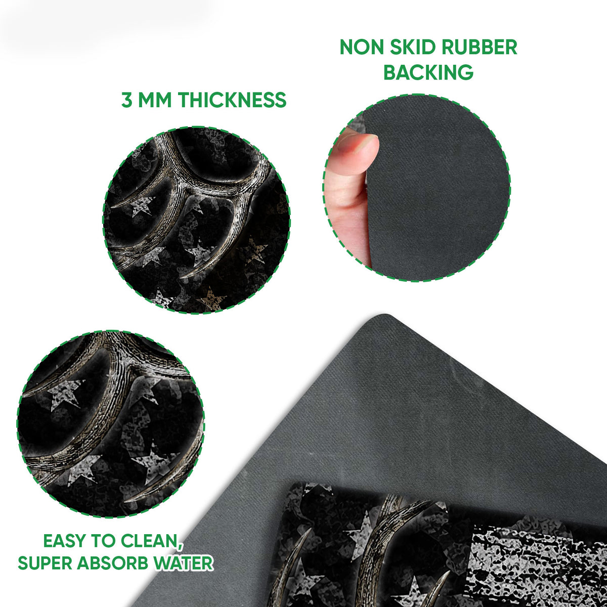 Close-up view of the hunting doormat artwork and dark rubber backing in a product feature presentation