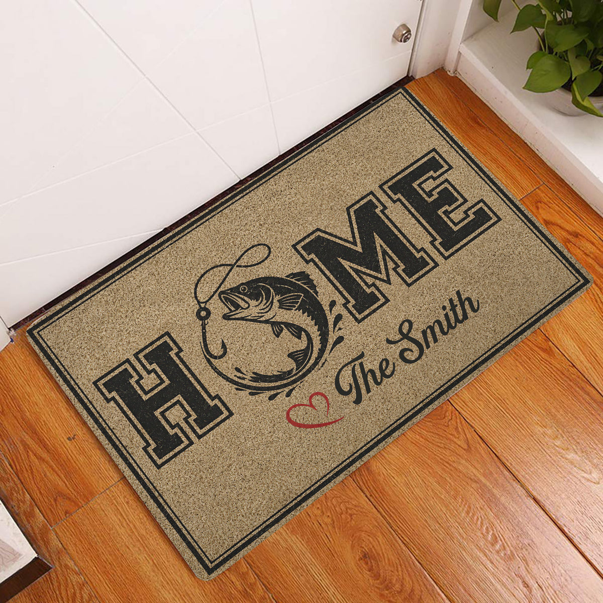 Fishing-themed doormat displayed at a home entrance on a wood floor with a fish and bold lettering