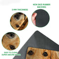 Close-up detail of Golden Retriever doormat artwork and dark rubber backing with feature callouts
