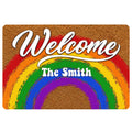 Rainbow Pride doormat with white Welcome lettering and a colorful arc design