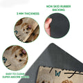 Feature view of a Goldendoodle doormat showing the printed felt surface, thin profile, and black rubber backing