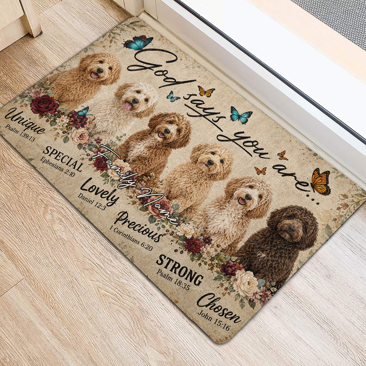 Goldendoodle door mat positioned at an entryway, featuring curly dogs, butterflies, flowers, and inspirational lettering
