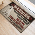 German Shepherd warning door mat styled at an indoor entrance with bold distressed lettering and dog artwork