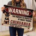 Person holding a Chihuahua warning artwork doormat indoors to show its full printed design