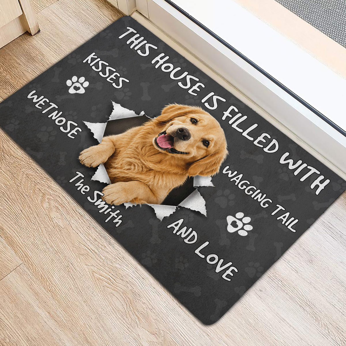 Golden Retriever entryway mat shown beside a door with playful dog-themed artwork