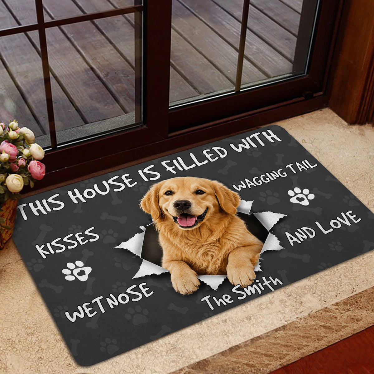 Golden Retriever doormat styled in a home entrance near a glass door
