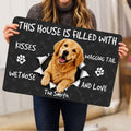 Golden Retriever doormat held indoors, featuring a happy dog and paw print design