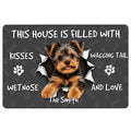 Yorkie doormat with a cheerful Yorkshire Terrier bursting through a dark paw and bone pattern