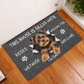 Yorkie doormat styled in an indoor entryway beside a white door and warm wood flooring