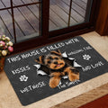 Yorkie entryway mat shown near a glass door with a smiling dog and dark bone pattern