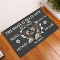 Miniature Schnauzer doormat styled at an indoor entryway beside a white door and warm wood flooring