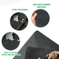 Close-up detail view of the pug doormat surface, edge and rubber backing construction