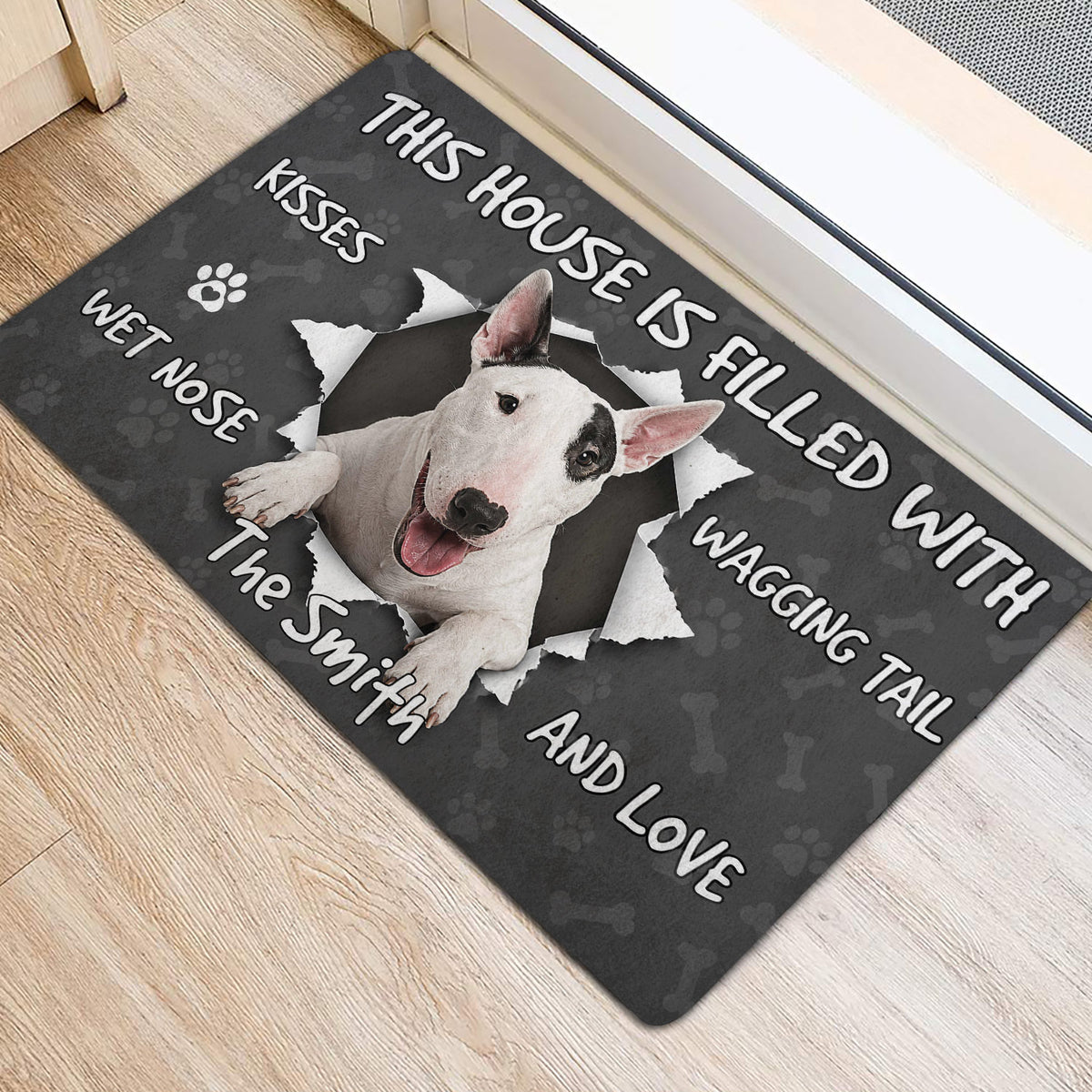 Bull Terrier entryway mat positioned near a doorway on a light wood floor