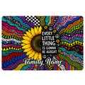 Colorful hippie doormat featuring a sunflower, peace symbols, psychedelic patterns, and an uplifting central message